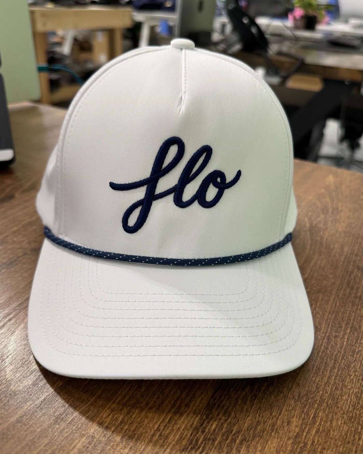 FLO branded long sleeve shirts, tees, and hats from the new FLO apparel drop